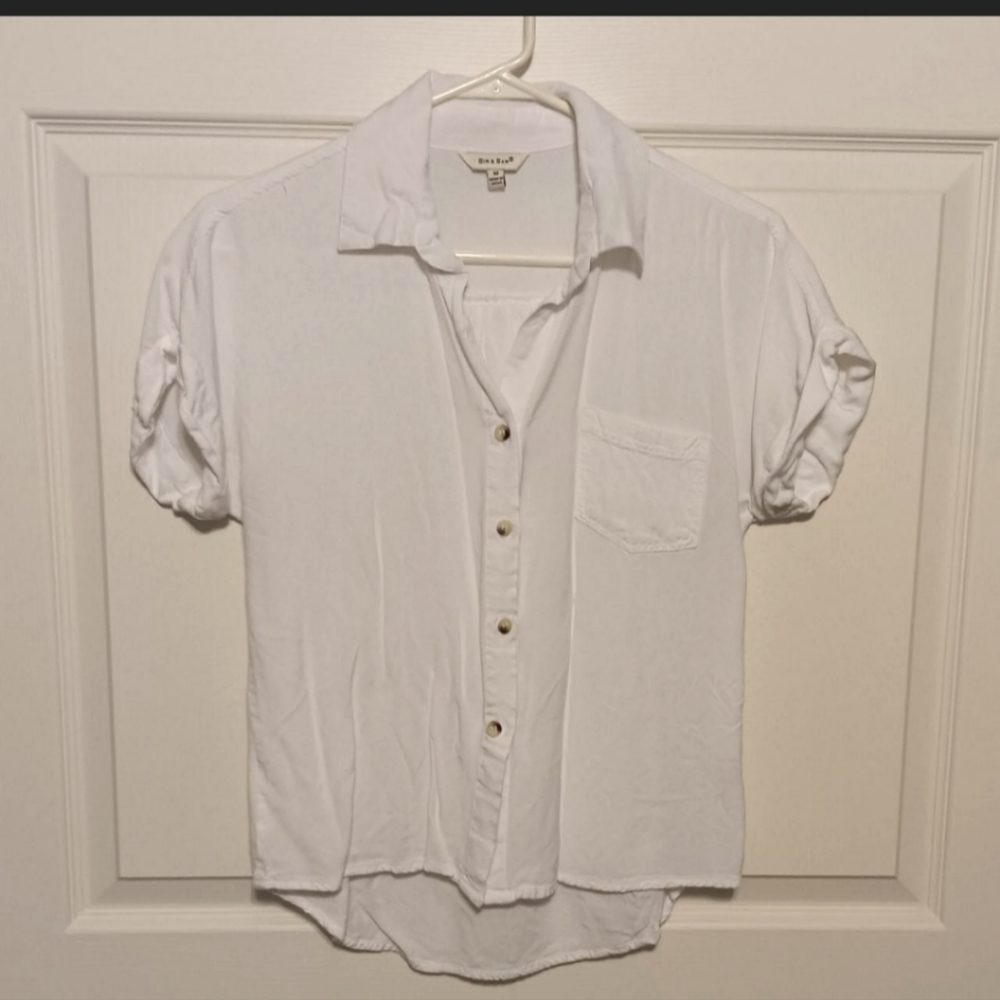 White button down shirt with cuffed sleeves